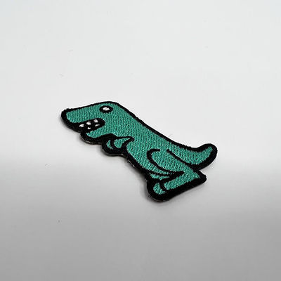 De dinosaurus PMS kleurt 5CM Douane Geborduurd Flardenijzer op Kledingsflarden