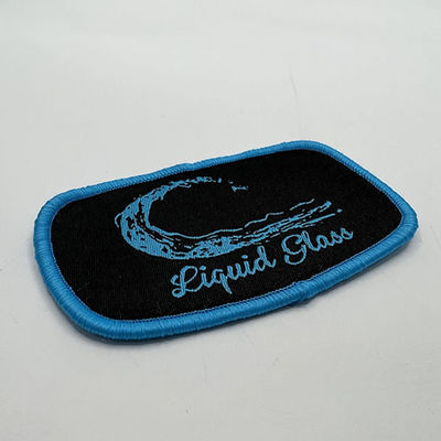 Douanemerknaam Logo Patches Iron On Patches met Blauwe Merrowed-Grens